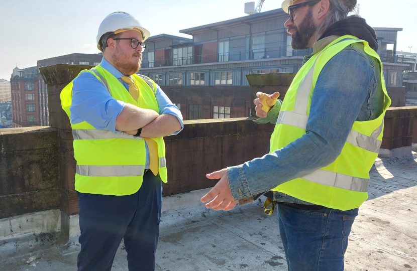 Cllr Thomas Kerr on a housing development site in Glasgow